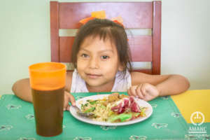 Citlali taking her food.