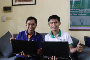 Operations Man. & ICT Teacher collecting resources