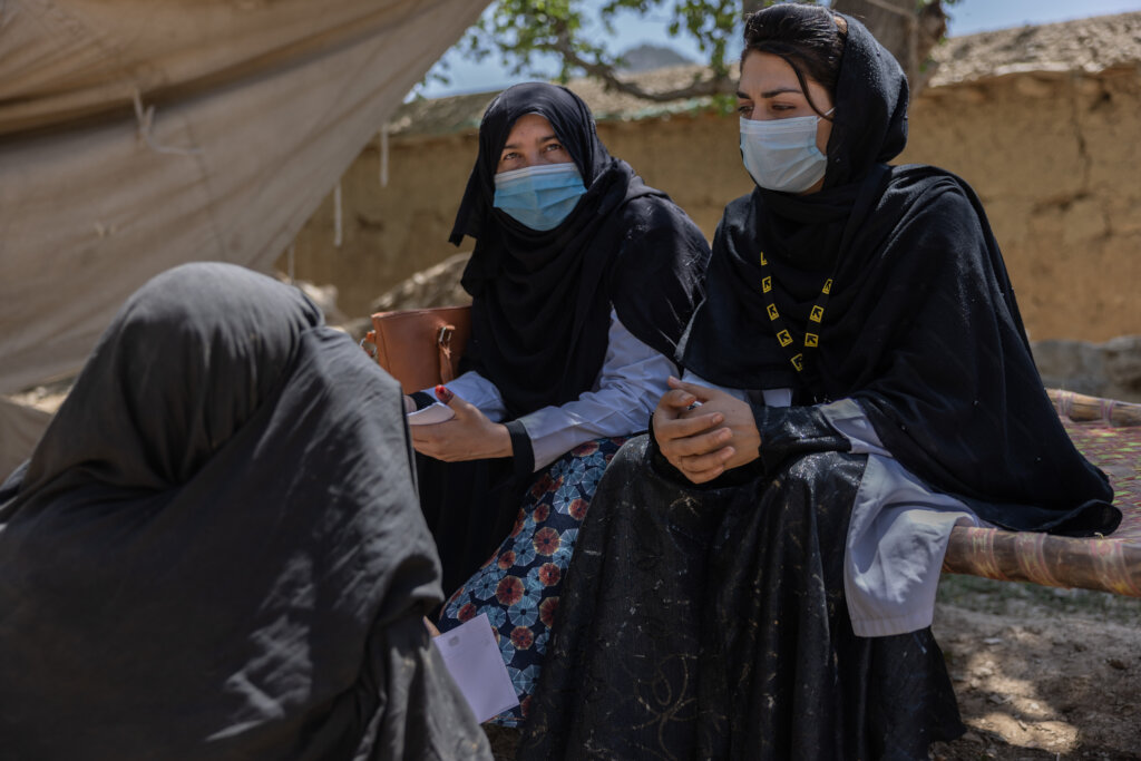 Afghan women wearing masks for protection
