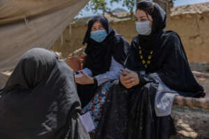 Afghan women wearing masks for protection