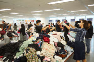 Volunteers Sorting Donated Clothes