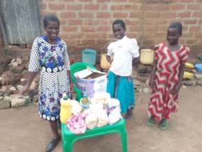 Josephine and her family with their supplies