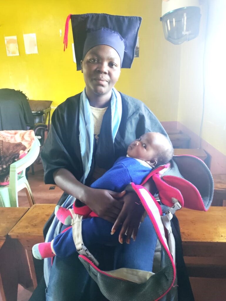 Young mother Mary at her graduation in Kariti