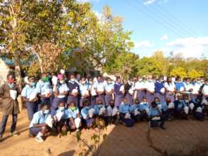 Seed of Hope students with their bags of rice