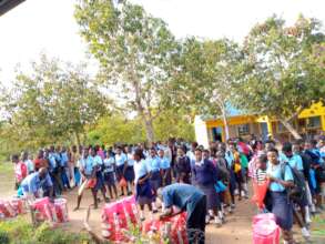 Students receiving food packs