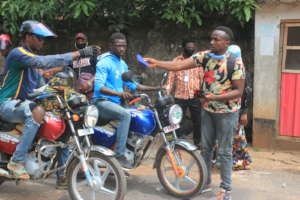 Distributing masks to okadas - bike riders