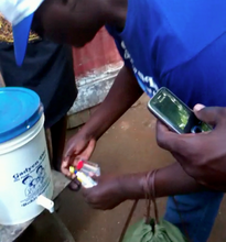 DSI Supervisor testing a family's water
