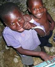 Boys excited about Buckets of Life delivery