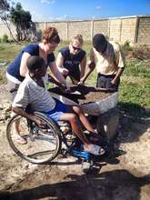Getting our hands dirty with raised flower beds