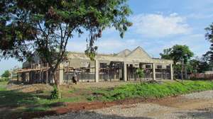 Rehabilitation building reaches roof level