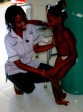 Aimable who has clubbed feet & walks on her ankles