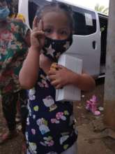 A girl hugging her meal for the day