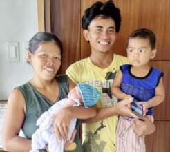 Happy family after birth of second baby