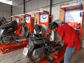 2-wheeler servicing workshop at SkillAbility