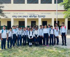 Children pose at a newly added school under SQEP