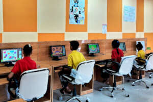 Children learn computers at Anti Begging Program