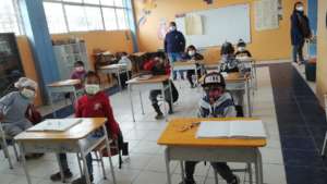 Masks and protective clothing for the teachers