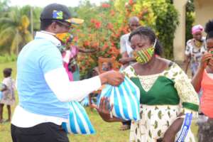 Giving food to the physically challenged