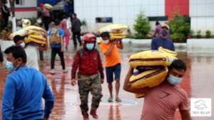 Distributing Rice to 300 families