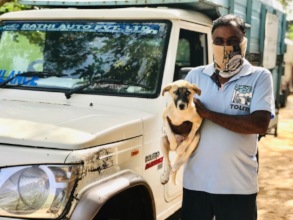 TOLFA ambulance driver with a recovered puppy