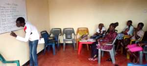 Participants taking lessons