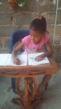 Student filling out a study guide - Cartagena