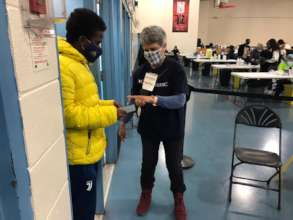 GlobalMedic Volunteers Assisting at Vaccine Clinic