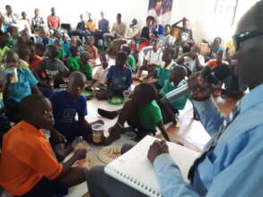 Visually impaired youth Dan reading for students