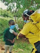 CHAT CORP helping a child put on a mask