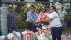 Red COMAL staff in Honduras distributing aid kits