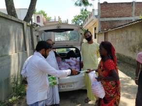 Distribution of Sanitization material and Grains