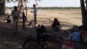 Distributing Food to Street Workers