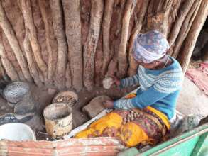 EXTRACTING NUT OIL - DAMBWA VILLAGE