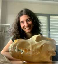 Isabel Salado and a wolf skull at EBD-CSIC