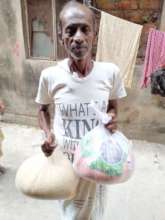 Beneficiary receives food parcel
