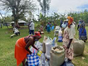 A section of the beneficiaries receiving foodstuff