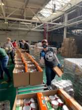Photo of a corporate volunteer at Distribution Cen