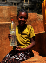 Smily girl with clean water