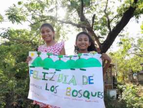 Two Junior Rangers share Forest Day poster