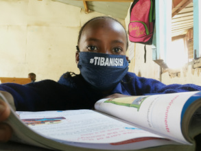 Grade 4 student in donated mask ready to learn!
