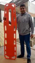 Missionary with backboard
