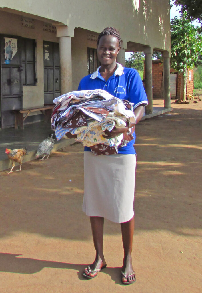 Nurse Assistant Beatrice with Blankets for Babies