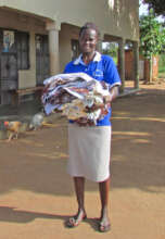 Nurse Assistant Beatrice with Blankets for Babies