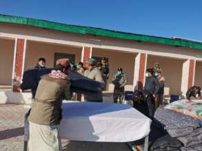 Quilts being Handed Over to the Needy