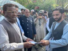 Relief Goods are being Handed Over to Afghans