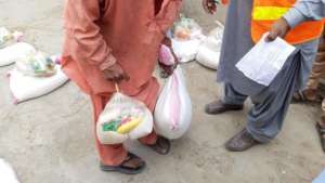 An Old Man receiving Ration Package