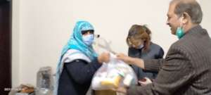 A Needy Women Receiving Ration