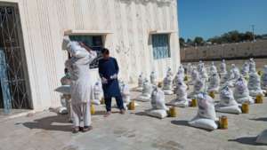 Ration Packages being Distributed among Needy