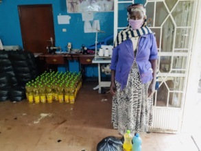A caregiver receives supplies for her home