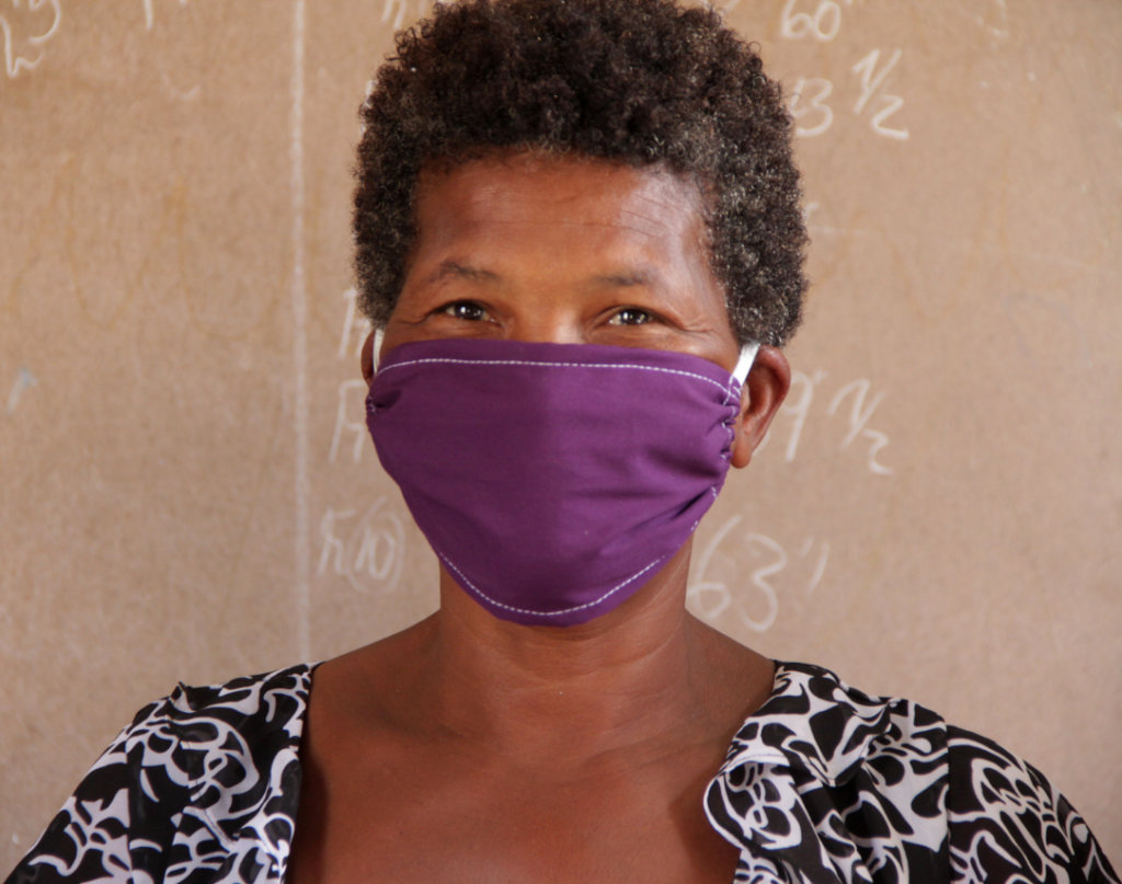 An Adult Survivor of Child Slavery who made masks.